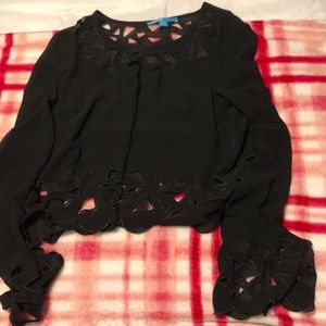 Cute mesh long sleeved shirt with cut outs!